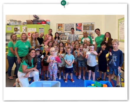 IFS employees serve ice cream to Newburyport Youth Services kids